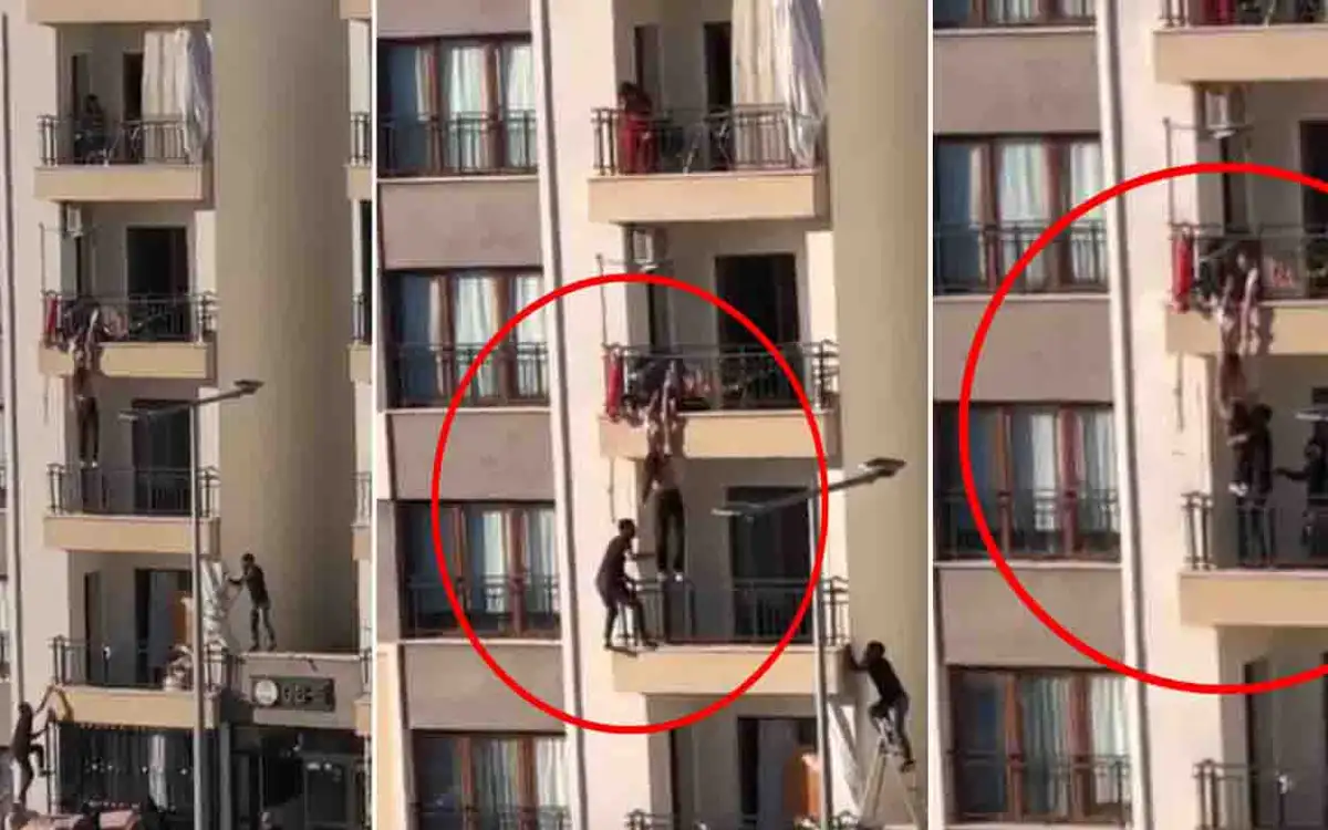 İkinci kata tırmandı, balkondan düşmek üzere olan çocuğu kurtardı