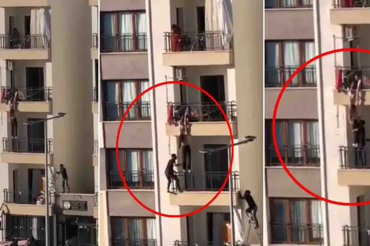İkinci kata tırmandı, balkondan düşmek üzere olan çocuğu kurtardı